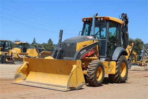 mini excavator vs skid steer